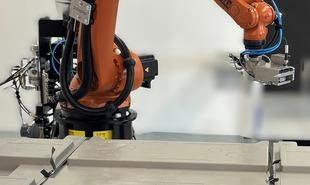 Il robot di reggiatura rimuove 310